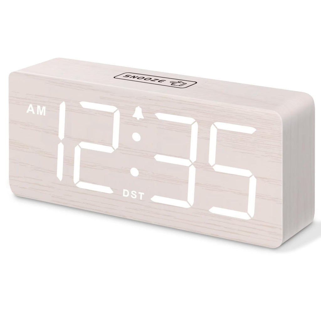 The DreamSky wooden digital alarm clock features wireless charging and is suitable for bedrooms and bedside tables. It comes with a charging dock, USB port, and large digital display.