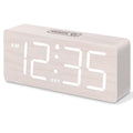 The DreamSky wooden digital alarm clock features wireless charging and is suitable for bedrooms and bedside tables. It comes with a charging dock, USB port, and large digital display.