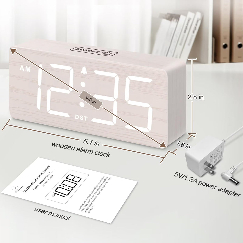 The DreamSky wooden digital alarm clock features wireless charging and is suitable for bedrooms and bedside tables. It comes with a charging dock, USB port, and large digital display.